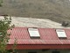 Monesi, tempesta di acqua e vento: a pagarne le spese il tetto del condominio Miramonti (foto e video)