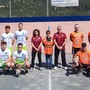 Le quadrette schierate a centrocampo prima del fischio d'inizio