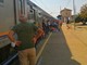 Incendio lungo la ferrovia in provincia di Torino blocca tutti i treni per la Liguria: convogli fermi per ore sotto il sole