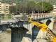 Imperia, demolizione del ponte di Piani: primo colpo di benna (foto e video)