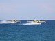 I due canadair della Protezione Civile in azione sul mare dell'albenganese (foto di Roberto Ruaro)